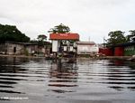 Total gas station along a lagoon in Ombue, Gabon