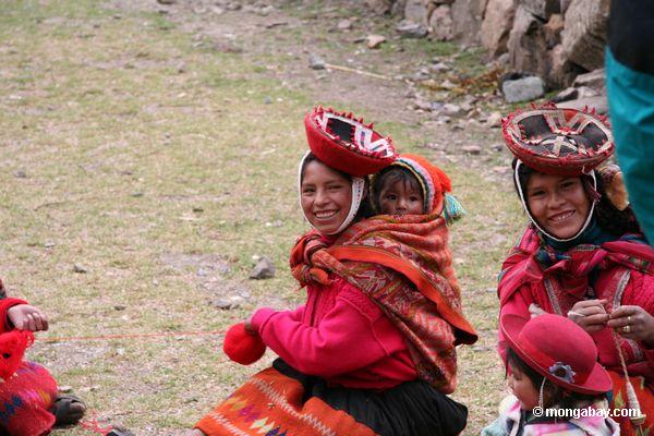 Smiling mothers with babies on their backs in the Sacred Valley near Ollantaytambo outside of Cuzco, Peru. Photo by: Rhett A. Butler.