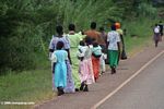 Mothers and children walking home from church