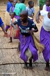 Bwindi children, many of whom are AIDS orphans, singing and dancing