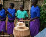 Bwindi orphans drumming during a performance