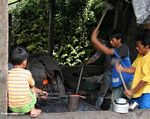 Blacksmiths mnking parang (Toraja Land (Tana Toraja), Sulawesi)
