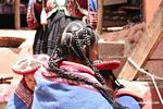 Quencha woman showing her braided hair