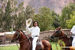 Cowboys on dancing horses in the Peruvian Andes