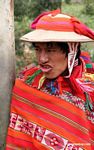 Willoq man in Ollantaytambo wearing traditional red clothing