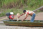 Local man bailing his canoe