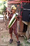 Toraja boy with bamboo tube full of palm wine (Toraja Land (Torajaland), Sulawesi) 