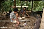 Men making bamboo sheaths for hand knives (Toraja Land (Torajaland), Sulawesi) 