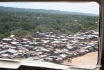Miners' shantytown next to Rio Huaypetue gold mine
